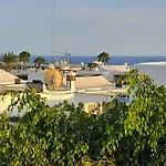 Vincent, Cozy And Sunny Over The Rooftops アパート プエルト・デル・カルメン