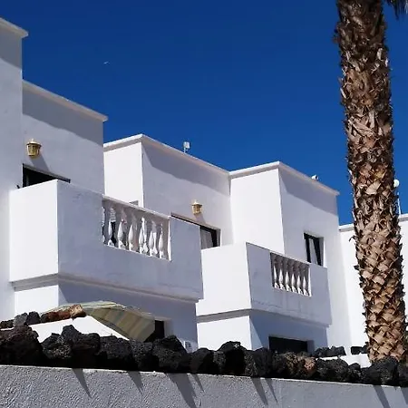 Vincent, Cozy And Sunny Over The Rooftops Puerto del Carmen (Lanzarote)